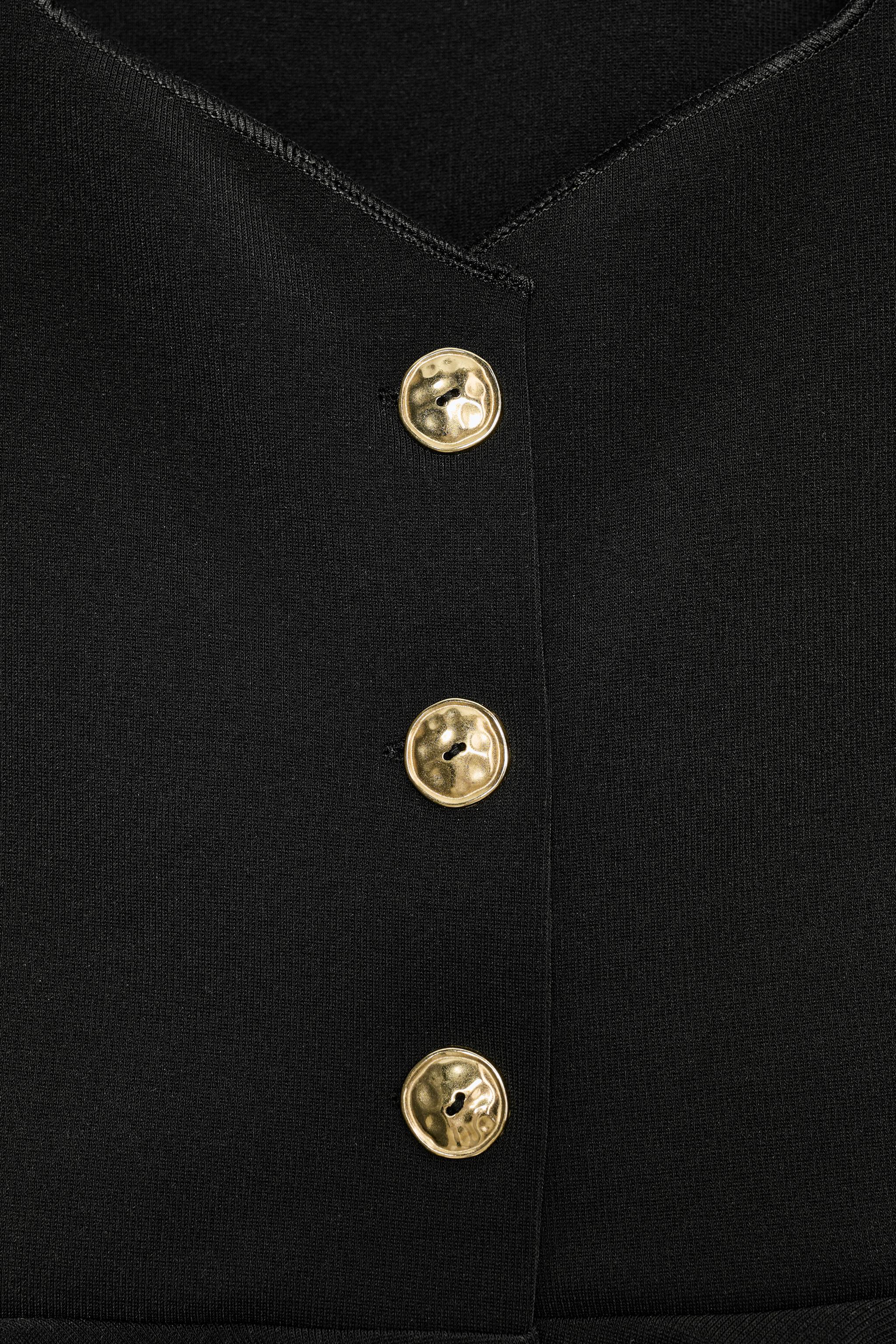 BUTTONED PEPLUM TOP